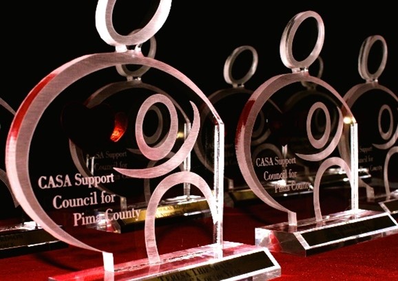 Image of awards given at CASA Recognition Luncheon